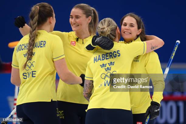 Anna Hasselborg, Sofia Mabergs, Sara McManus Agnes Knochenhauer of Team Sweden celebrate their victory against Team United States during the Women's...