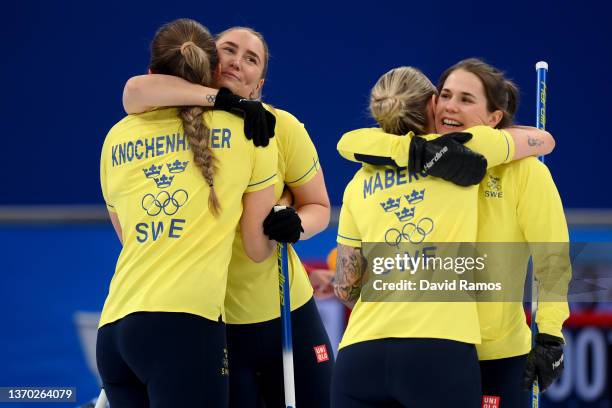 Anna Hasselborg, Sofia Mabergs, Sara McManus Agnes Knochenhauer of Team Sweden celebrate their victory against Team United States during the Women's...