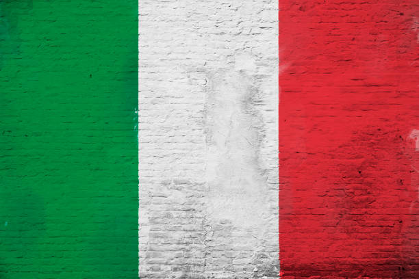 full frame photo of a weathered flag of italy painted on a plastered brick wall. - italy flag stock pictures, royalty-free photos & images
