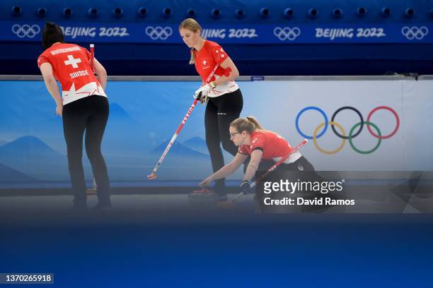 Alina Paetz, Melanie Barbezat and Esther Neuenschwander of Team Switzerland compete against Team Canada during the Women's Curling Round Robin...