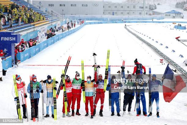 Gold medallists Alexey Chervotkin, Alexander Bolshunov, Denis Spitsov and Sergey Ustiugov of Team ROC , Silver medallists Emil Iversen, Paal Golberg,...