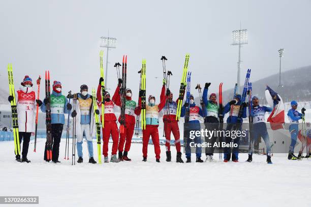 Gold medallists Alexey Chervotkin, Alexander Bolshunov, Denis Spitsov and Sergey Ustiugov of Team ROC , Silver medallists Emil Iversen, Paal Golberg...