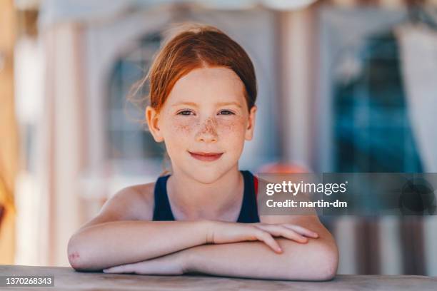 portrait girl at the beach - kid arms crossed stock pictures, royalty-free photos & images