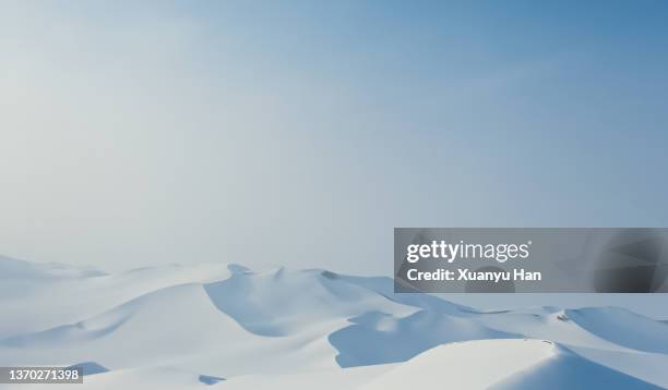 snow covered desert scenery in winter - schneewehe stock-fotos und bilder