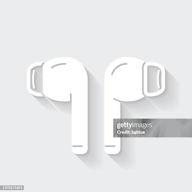 wireless earphones. icon with long shadow on blank background - flat design - wireless earbuds stock illustrations