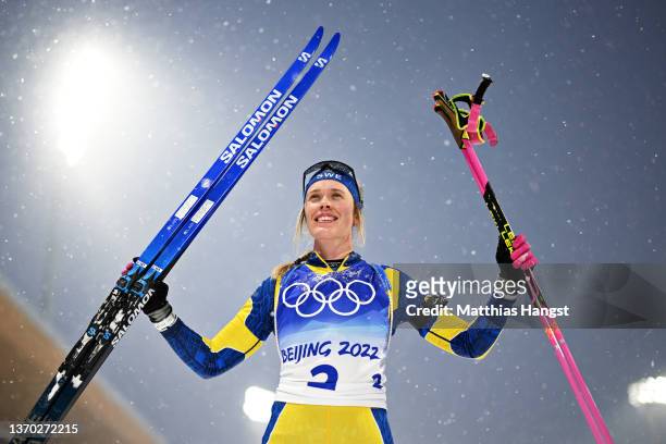 Elvira Oeberg of Team Sweden celebrates winning silver during Biathlon Women's 10km Pursuit on Day 9 of Beijing 2022 Winter Olympics at National...