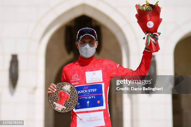 Fausto Masnada of Italy and Team Quick-Step - Alpha Vinyl celebrates winning the Red Leader Jersey on the podium ceremony after the 11th Tour Of Oman...