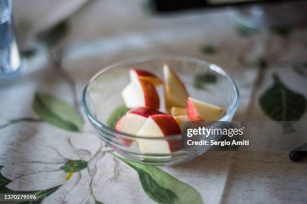sliced apple in glass bowl - cutting green apple stock pictures, royalty-free photos & images