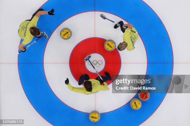 Agnes Knochenhauer, Anna Hasselborg and Sofia Mabergs of Team Sweden compete against Team United States during the Women's Curling Round Robin...