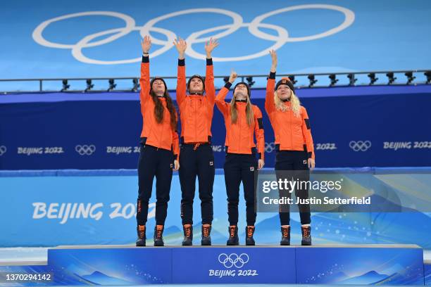 Gold medallists Team Netherlands celebrate during the Women's 3000m Relay Final A flower ceremony on day nine of the Beijing 2022 Winter Olympic...