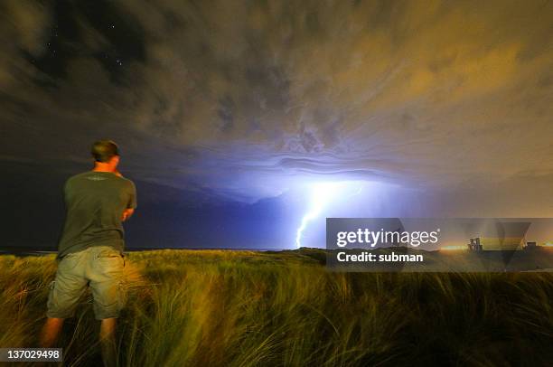 watching storm approaching - watching thunderstorm stock pictures, royalty-free photos & images