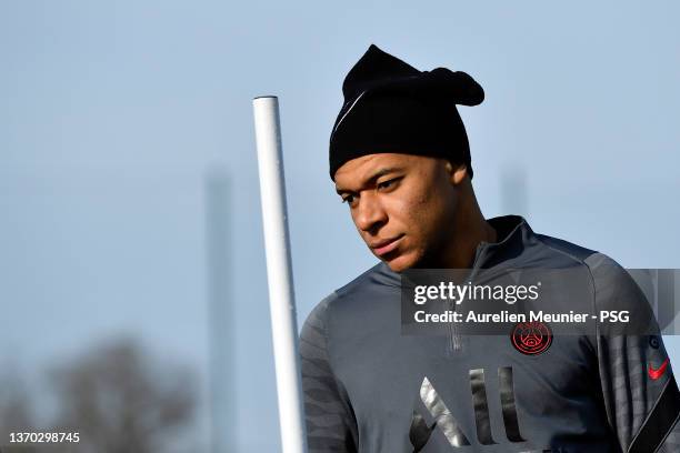 Kylian Mbappe looks on during a Paris Saint-Germain training session at Ooredoo Center on February 13, 2022 in Paris, France.