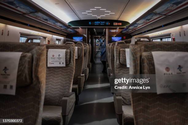 Train attendant seen on a high-speed rail from Beijing to Yanqing on February 11, 2022 in Beijing, China. The Beijing 2022 Winter Olympics is being...