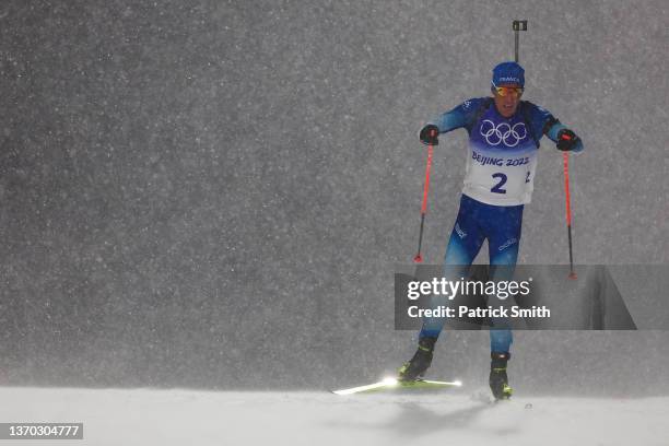 Quentin Fillon Maillet of Team France skis during the Biathlon Men's 12.5km Pursuit on Day 9 of Beijing 2022 Winter Olympics at National Biathlon...