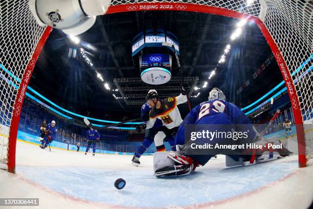Patrick Hager of Team Germany reacts after scoring during the Men's Ice Hockey Preliminary Round Group A match between Team United States and Team...