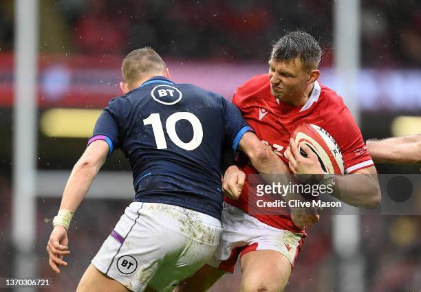 Dan Biggar of Wales takes on Finn Russell of Scotland during the Guinness Six Nations match between Wales and Scotland at Principality Stadium on...