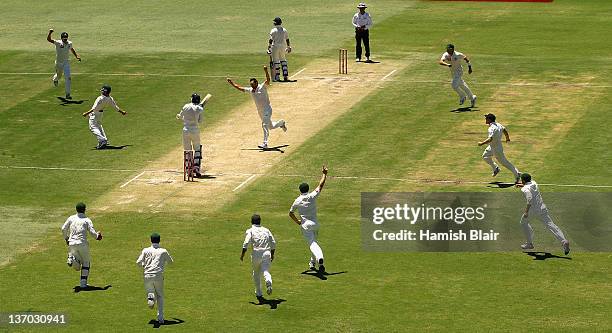 Ben Hilfenhaus of Australia celebrates the wicket of Ishant Sharma of India during day three of the Third Test match between Australia and India at...