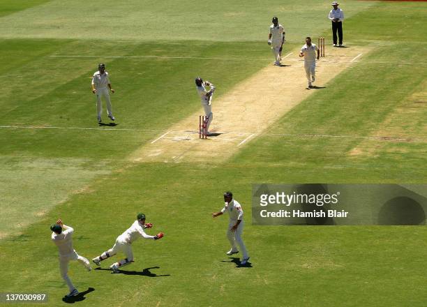 Michael Clarke of Australia takes a catch to dismiss Zaheer Khan of India from the bowling of Ben Hilfenhaus of Australia during day three of the...