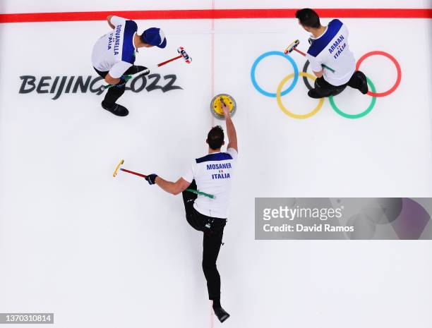Mattia Giovanella, Amos Mosaner and Sebastiano Arman of Team Italy compete against Team Switzerland during the Women's Curling Round Robin Session on...