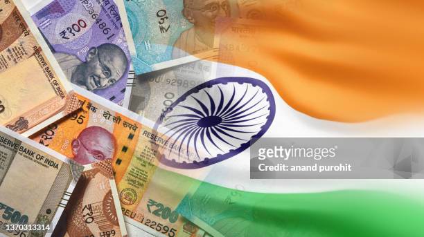 indian rupee (inr) with indian flag - economy stock pictures, royalty-free photos & images