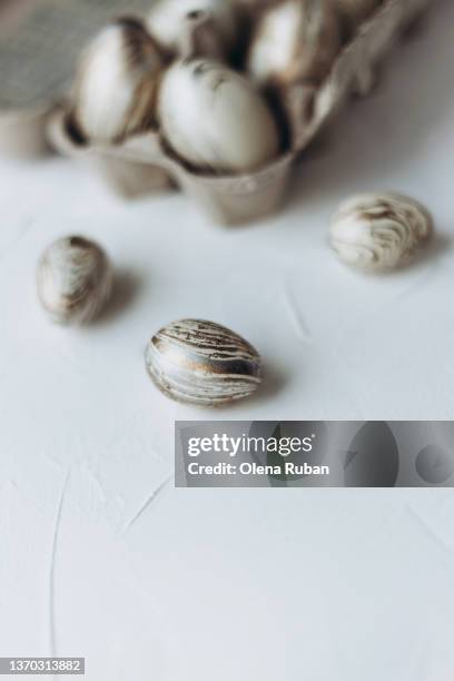 quail eggs on white surface. - uovo di quaglia foto e immagini stock