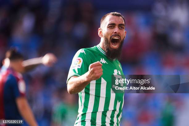 Borja Iglesias of Real Betis celebrates after scoring goal his team mateNabil Fekir during the LaLiga Santander match between Levante UD and Real...