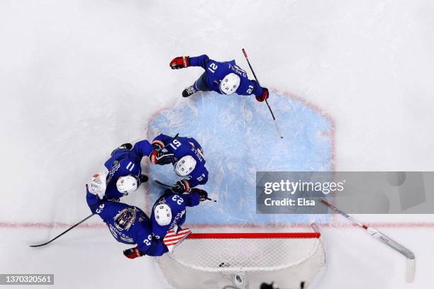 Team USA celebrate their victory during the Men's Ice Hockey Preliminary Round Group A match between Team United States and Team Germany on Day 9 of...