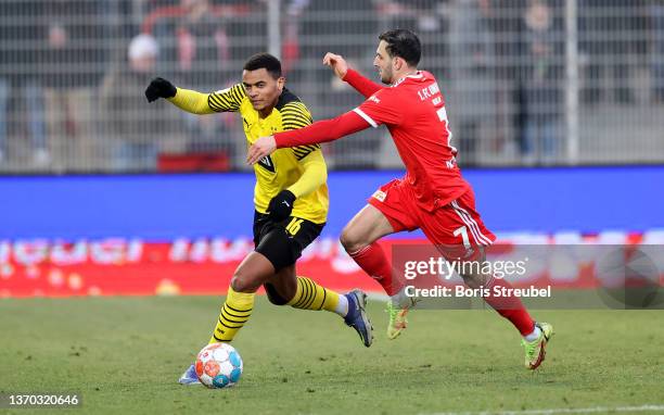 Levin Öztunali of 1. FC Union Berlin challenges Manuel Akanji of Borussia Dortmund during the Bundesliga match between 1. FC Union Berlin and...