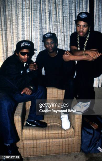 Rappers Eazy-E , MC Ren and Ice Cube of N.W.A. Poses for photos after an interview at the Holiday Inn Lakeshore in Chicago, Illinois in February 1989.