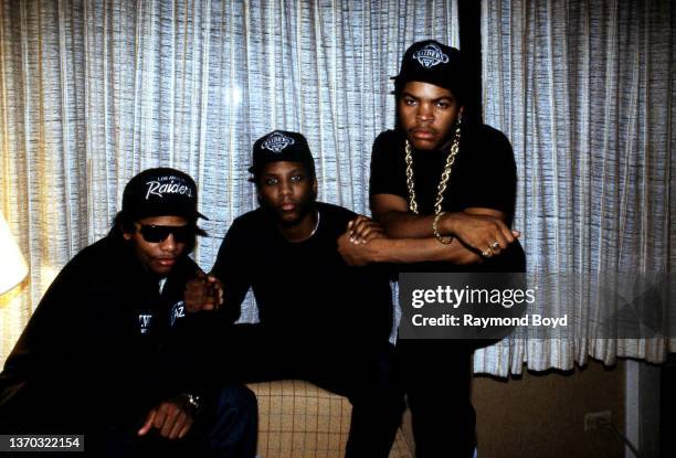 Rappers Eazy-E , MC Ren and Ice Cube of N.W.A. Poses for photos after an interview at the Holiday Inn Lakeshore in Chicago, Illinois in February 1989.