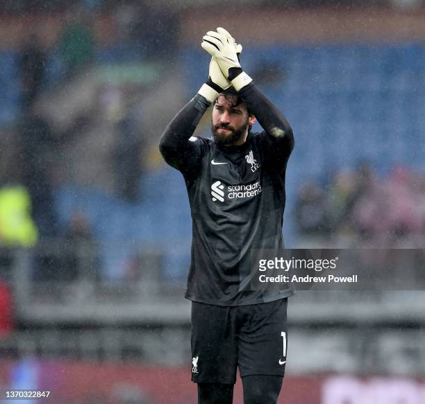 Alisson Becker of Liverpool showing his appreciation to the fans at the end of the Premier League match between Burnley and Liverpool at Turf Moor on...