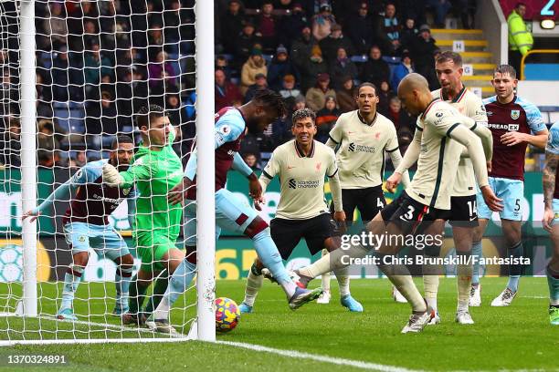 Fabinho of Liverpool scores the opening goal during the Premier League match between Burnley and Liverpool at Turf Moor on February 13, 2022 in...