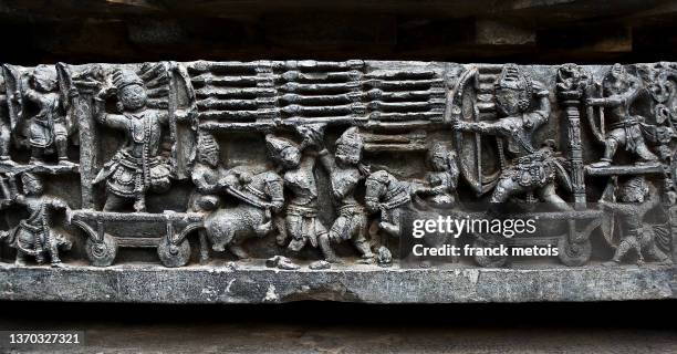 sculpture in the hoysaleswara temple ( india) - indian mythology stock pictures, royalty-free photos & images