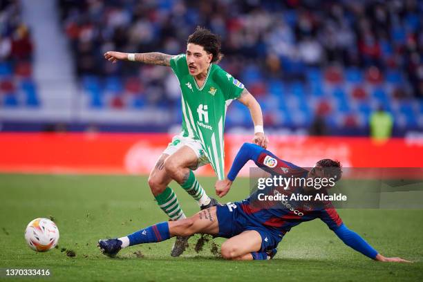 Hector Bellerin of Real Betis competes for the ball with Marc Pubill of Levante UDduring the LaLiga Santander match between Levante UD and Real Betis...