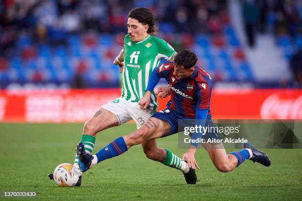 Hector Bellerin of Real Betis competes for the ball with Marc Pubill of Levante UDduring the LaLiga Santander match between Levante UD and Real Betis...