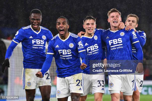 Ricardo Pereira celebrates with teammates Patson Daka, Luke Thomas, Harvey Barnes and Kiernan Dewsbury-Hall of Leicester City after scoring their...