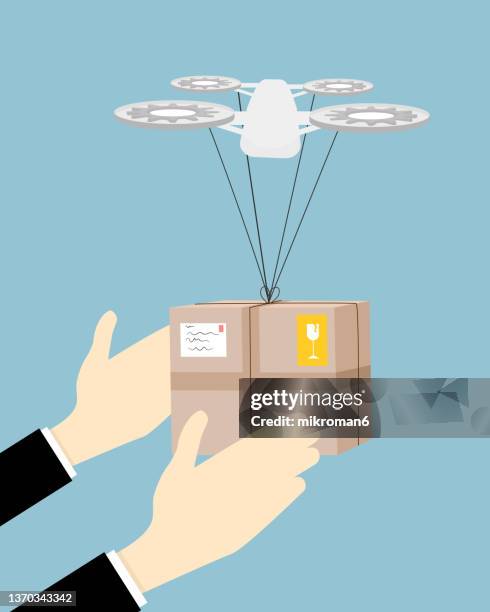 vector of a drone delivering a large package to someone - e commerce vector stock pictures, royalty-free photos & images