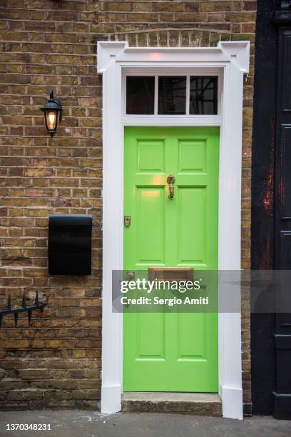 green door on georgian house - front door stock pictures, royalty-free photos & images