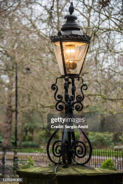 gas lamp by st. james's' park, london - lamp stock pictures, royalty-free photos & images