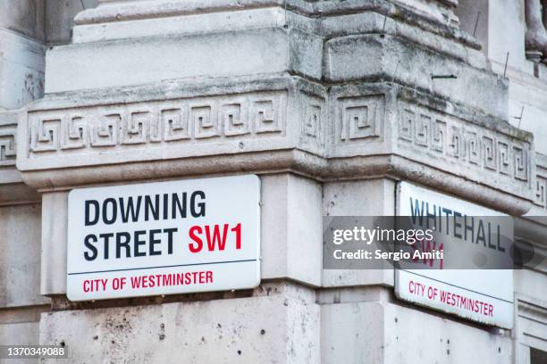 downing street and whitehall signs - downing street sign stock pictures, royalty-free photos & images