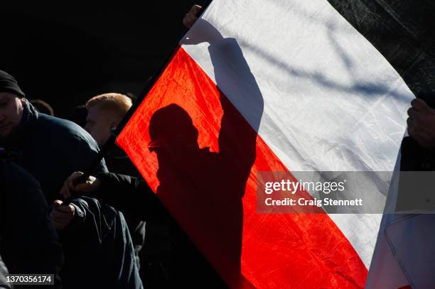 People take part in the Dresden Memorial March held by the Far-Right under the title of 'Action Alliance against Forgetting' on February 13, 2022 in...