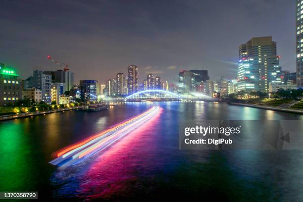 sumida river, long exposure - the package tour stock pictures, royalty-free photos & images