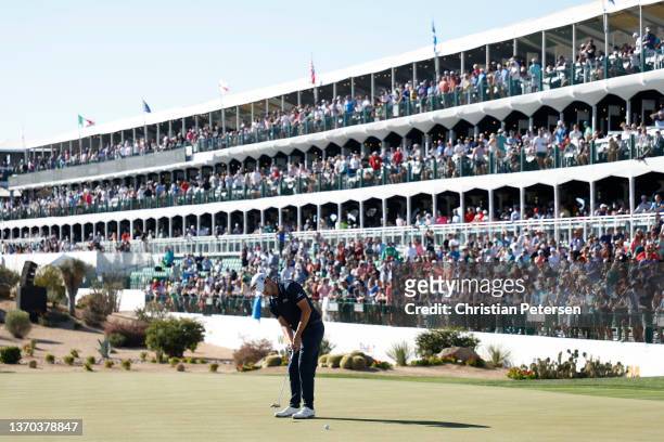 Patrick Cantlay of the United States putts on the 16th hole green during the final round of the WM Phoenix Open at TPC Scottsdale on February 13,...