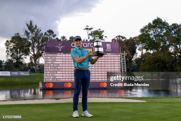 Brandon Matthews of the United States celebrates with the trophy after winning the Astara Golf Championship presented by Mastercard at Country Club...