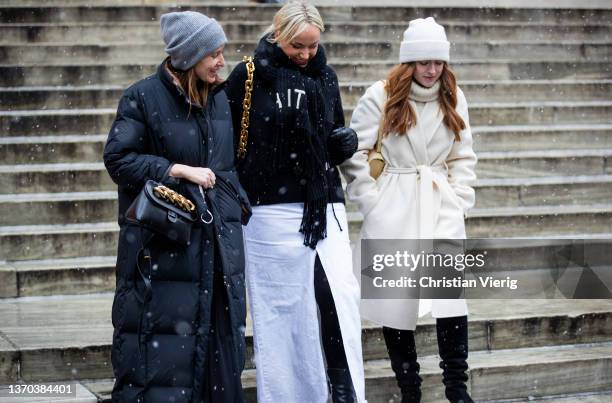 Guests seen outside during New York Fashion Week on February 13, 2022 in New York City.