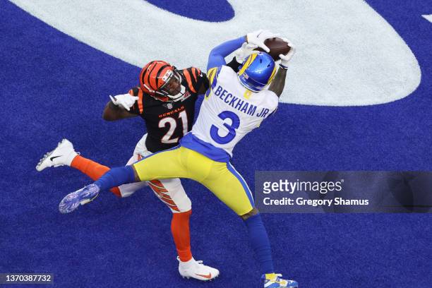 Odell Beckham Jr. #3 of the Los Angeles Rams makes a catch over Mike Hilton of the Cincinnati Bengals for a touchdown in the first quarter during...