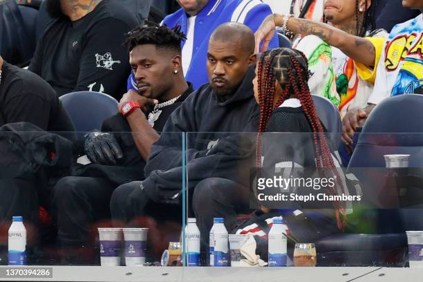 Antonio Brown, Kanye West and North West attend Super Bowl LVI between the Los Angeles Rams and the Cincinnati Bengals at SoFi Stadium on February...