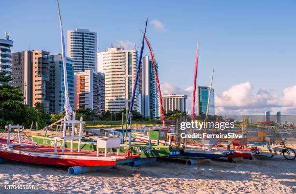 wood rafts in boa viagem beach - recife skyline imagens e fotografias de stock