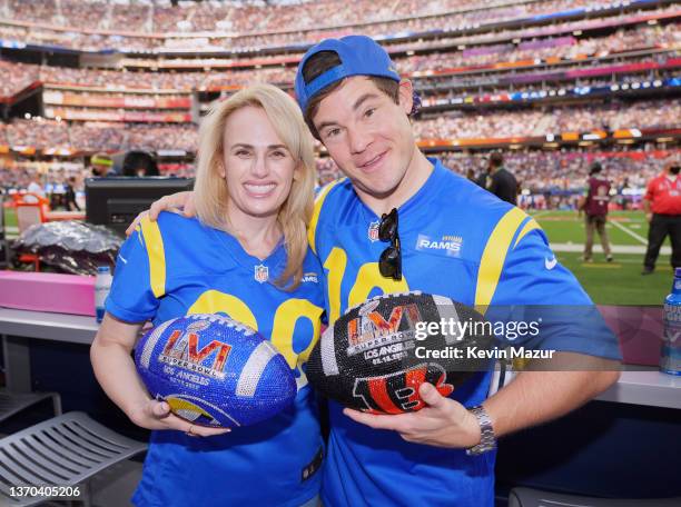 Rebel Wilson and Adam Devine attend Super Bowl LVI Pregame at SoFi Stadium on February 13, 2022 in Inglewood, California.