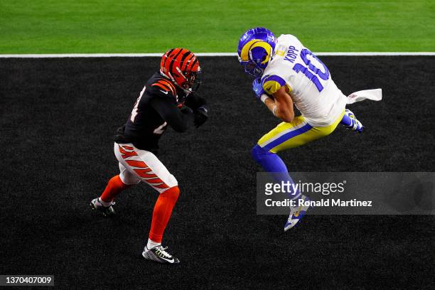 Cooper Kupp of the Los Angeles Rams makes a catch that was called back over Vonn Bell of the Cincinnati Bengals during Super Bowl LVI at SoFi Stadium...